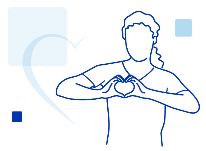 A group of four medical professionals working together. The team is standing side by side wearing scrubs, smiling at the camera.