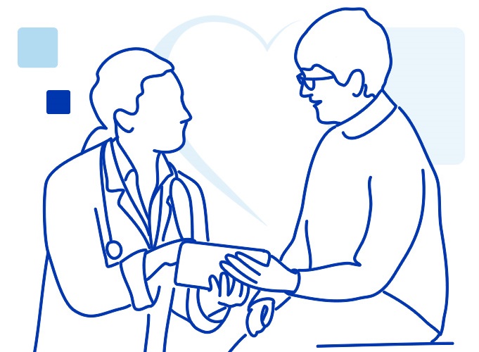 A caring female physician assistant smiles with compassion while talking with a senior female patient during a medical exam.