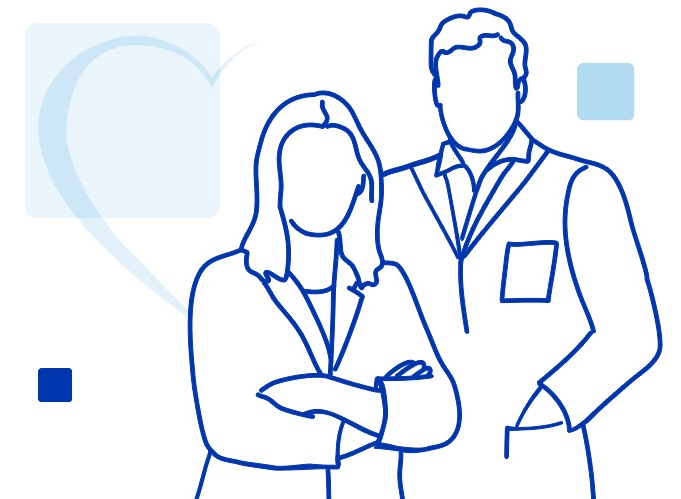 Male Pharmacist smiles at camera while holding clipboard.