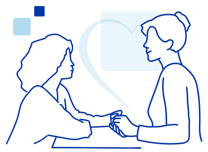 Female caregiver talking with senior woman, sitting and listening to her carefully.